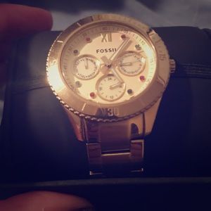 FOSSIL gold watch with crystal colored accents!